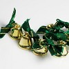 Strikjes met klokje groen-goud